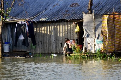 washing baby,  Saigon,  Vietnam 