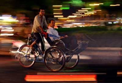 cyclo and passenger, Saigon, Vietnam  