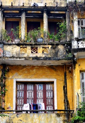 yellow building in Hanoi Old Quarter, Hanoi, Vietnam 