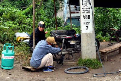 roadside repair station, Hanoi, Vietnam 