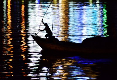 night fishing on Han River, Da Nang, Vietnam 