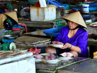 fish vendor, Hoi An  market, Hoi An, Vietnam 