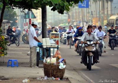 sidewalk cooking, Saigon, Vietnam 