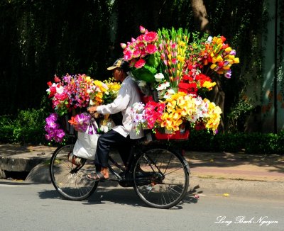 flowers delivery on bike, Saigon, Vietnam   