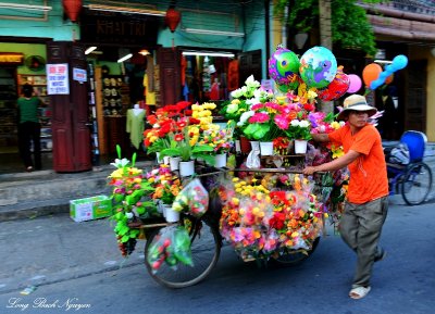 selling plastic flowers, Hoi An, Vietnam  