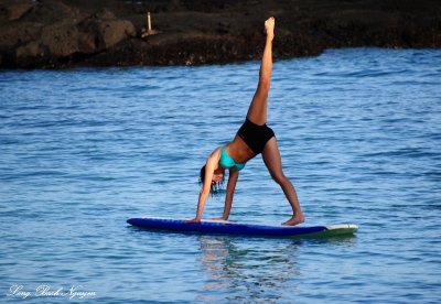 surf board yoga, Fairmont Orchid, Hawaii  