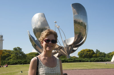 Jill in front of Floralis Generica, a massive scupture in a Recoleta park