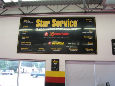 Penn Yan Xpress Lube - Star service sign