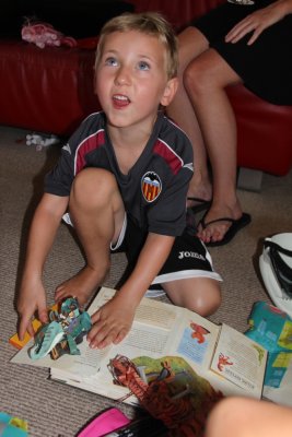 Toby loved his Dinosaur book