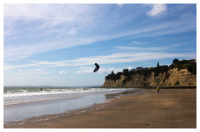 Kite-surfing along the beach