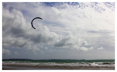 Kite-surfing along the beach