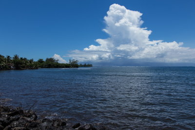 Clouds towering over Tahiti from Moorea