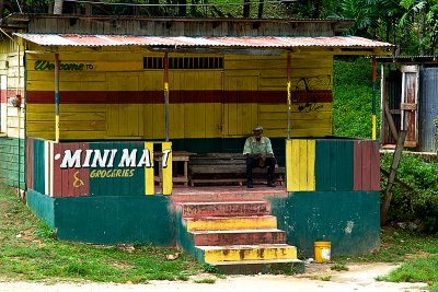 Old Man on Porch - Rural Jamaica