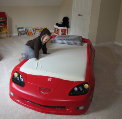 A new purchase:  Corvette car bed for Andy