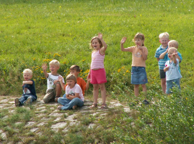 Children on the river bank
