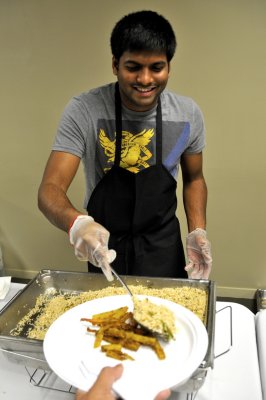 Person serving food at Indian Night at ISU _DSC7227.jpg
