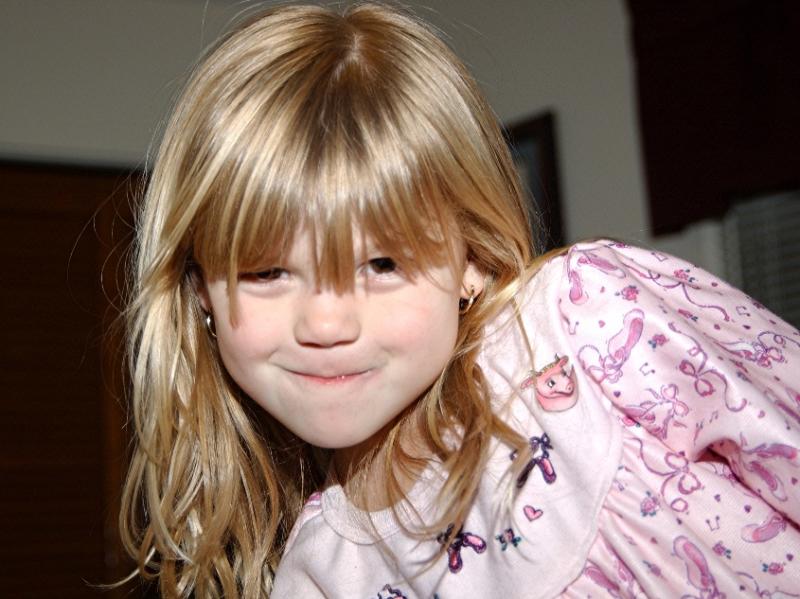 Alyssa posing for Grandpa.JPG