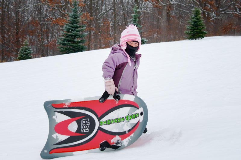 Caitlin goes sledding