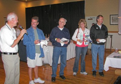Rich DeGlopper (l) thanks Dan Acierno, Gene Bianco, Barb and Doug Morin for the boats theyve brought to our boat shows.