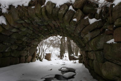 Snow under the stone bridge I