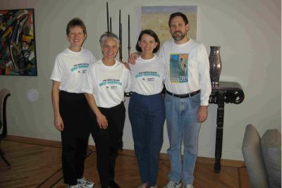 Cathie,  JoLee,  Susie, and Greg wear their Finishers T-shirts