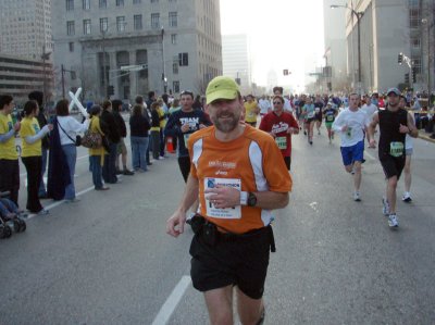 Greg coming back into downtown after mile 6