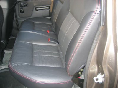 This is how my modded back seat looks. Fully functional! I just used longer bolts and spaced it out 1/2 an inch