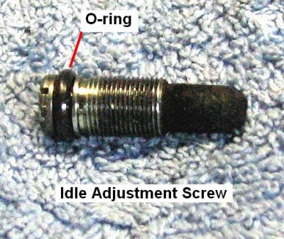 idle screw with carbon buildup