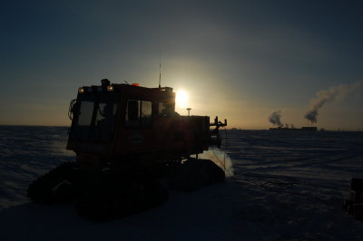 Sun behind the Sno-cat