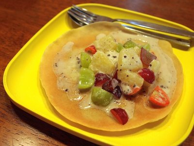 Fresh pancake with cold fruits