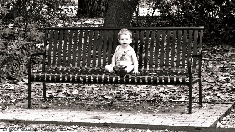 Sitting On A Bench, On A Lonely Sunday Morning. So Small, So Innocent, In A Great Big World.