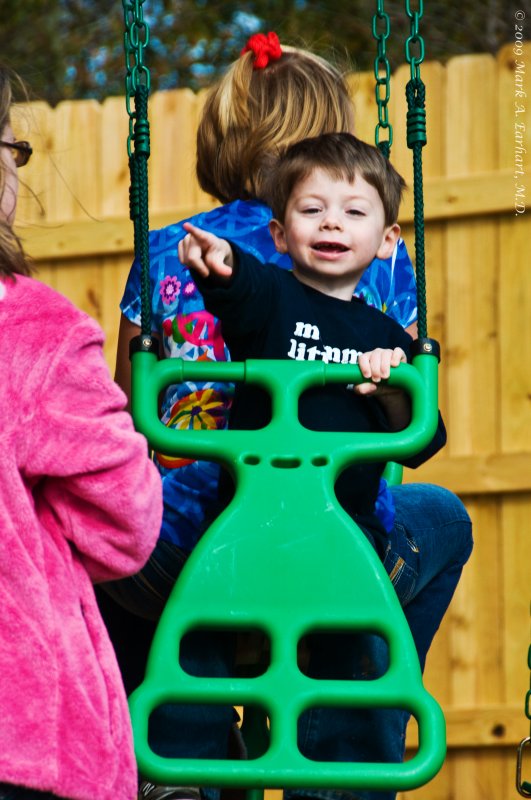 Eli Likes His Swing Set