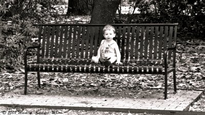 Sitting On A Bench, On A Lonely Sunday Morning. So Small, So Innocent, In A Great Big World.