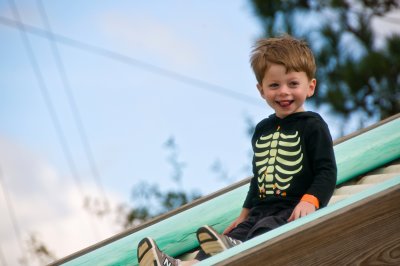 Sliding, Smiling Skelton Boy