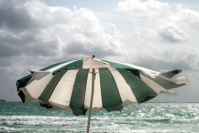 Green striped umbrella South Beach .jpg