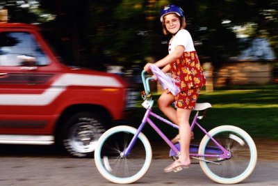 Riding her new bike...