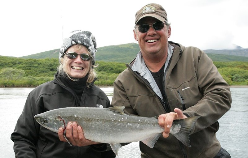 John and Denise holding one of the silvers