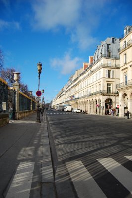 Rue de Rivoli (Rivoli St). Behind us and to the left is the Louvre.