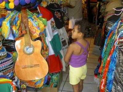 Checking out souveniers for her siblings