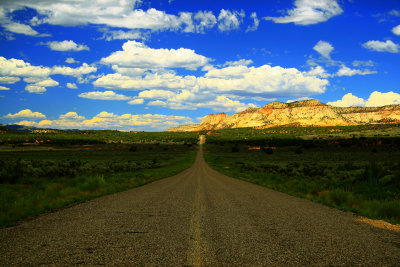Long road back to the highway from Pink Coral Sands State Park, Utah