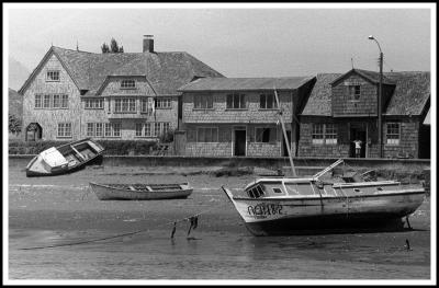 Houses and boats at low tide