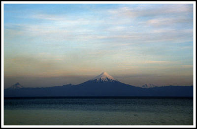 Puntiagudo (left) and Osorno (center) Volcanos and Cerro Tronador (right)