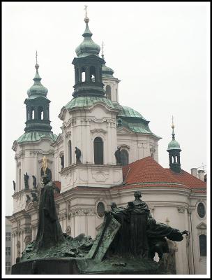 Hus Statue and St. Nicholas Church in background
