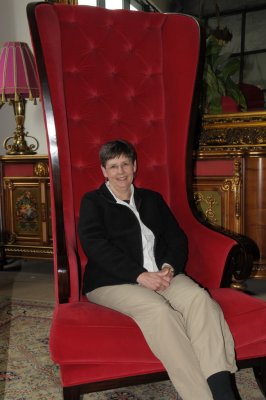 Glynda in the big chair at the Trinity Capital Hotel