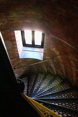 Lighthouse stairs, spiraling downward.