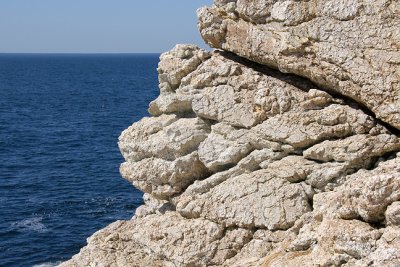 Ledges and the sea.