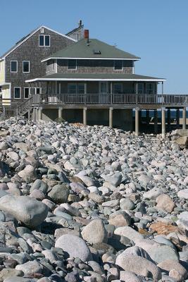 Cottage and cobbles, adjacent to Scituate Light