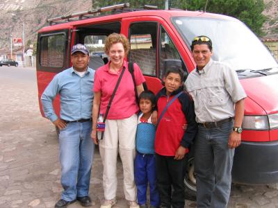 Guide, driver, and local kids