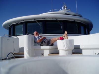 LEONARD RELAXING ON THE FOREDECK