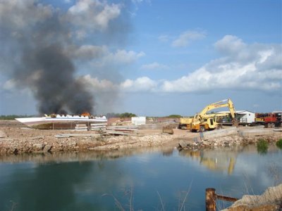 Customs burning illegals boats